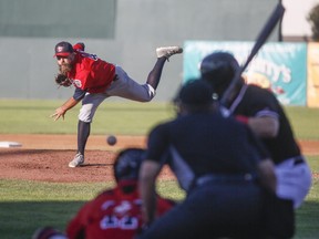 Winnipeg Goldeyes ace Mitchell Lambson pitches against the Fargo-Moorhead RedHawks during their game on July 22, 2020, at Newman Outdoor Field in Fargo, N.D.