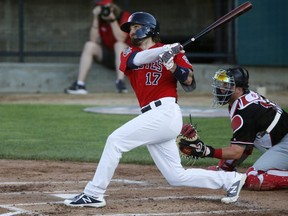 Goldeyes catcher John Nester follows the path of the ball after hitting a three-run home run against the Fargo-Moorhead RedHawks during the second inning on July 7, 2020 at Newman Outdoor Field in Fargo, N.D.