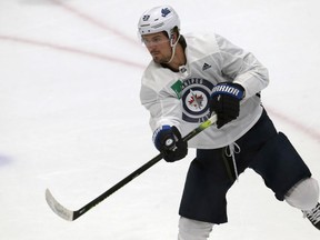 Mark Scheifele follows through on a shot during Winnipeg Jets summer training camp on Monday.