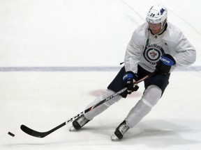 Everyone is wondering if Patrik Laine will be a member of the Jets when the NHL season starts.