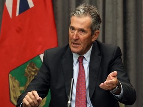 Premier Brian Pallister gestures during a press conference at the Manitoba Legislative Building in Winnipeg on Wed., July 29, 2020.
