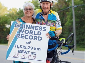Ruth and Arvid Loewen celebrate following Arvid smashing the Guinness World Record for the most distance pedaled in one month – 11,616 km, 301 km more than the previous world record.