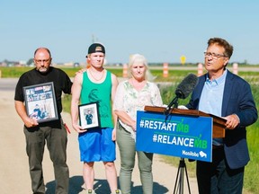 Manitoba Infrastructure Minister Ron Schuler dedicates improvements being made to the Perimeter Highway in the memory of Ethan Boyer as his family watches on Wednesday, Aug. 5, 2020. Handout