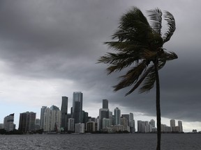 Storm clouds are seen over the city as Hurricane Isaias approaches the east coast of Florida on Aug. 1, 2020 in Miami.