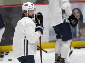 Josh Morrissey takes a breather during Winnipeg Jets training camp.