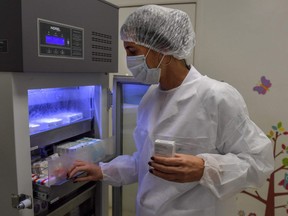 Brazilian pediatric doctor Monica Levi, a volunteer who received a potential COVID-19 vaccine, works at the Specialized Clinic in Infectious and Parasitic Diseases and Immunizations (CEDIPI), in Sao Paulo, Brazil, on July 24, 2020.