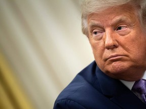 US President Donald Trump listens after announcing an agreement between the United Arab Emirates and Israel to normalize diplomatic ties, the White House August 13, 2020, in Washington, DC.