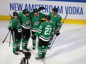Dallas Stars celebrate the goal scored by right wing Denis Gurianov (34) against the Colorado Avalanche during the third period in game four of the second round of the 2020 Stanley Cup Playoffs at Rogers Place. Mandatory Credit: Gerry Thomas-USA TODAY Sports