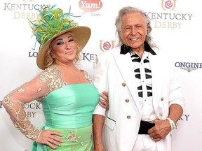 Musician Tanya Tucker, left, and executive Peter Nygard attend the 142nd Kentucky Derby at Churchill Downs on May 7, 2016, in Louisville, Kentucky.