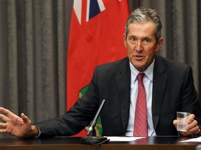 Premier Brian Pallister gestures during a press conference at the Manitoba Legislative Building in Winnipeg on Wed., July 29, 2020.