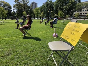 Safe September MB demonstrates what they believe would be safe social distancing would look like in classrooms, Thursday, Aug. 20, 2020 at the Manitoba Legislature.