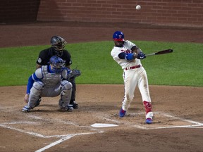 Andrew McCutchen of the Philadelphia Phillies hits a solo home run in the bottom of the third inning against the Toronto Blue Jays during Game 2 of the doubleheader at Citizens Bank Park on Sept. 18, 2020 in Philadelphia, Pa.