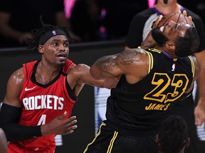 Houston Rockets guard Danuel House fouls LeBron James during the playoff series between the Houston Rockets and Los Angeles Lakers in Orlando. House got himself booted out of the bubble for allegedly allowing an illegal female guest into his room for multiple hours.