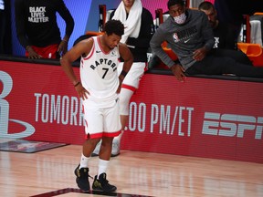 Raptors guard Kyle Lowry reacts after a loss to the Boston Celtics in Game 7 of their Eastern semifinal on Friday night.