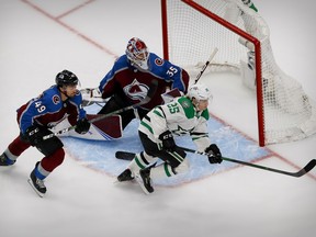 Colorado Avalanche defenceman Samuel Girard (49) and goaltender Michael Hutchinson (35) defend against Dallas Stars left wing Joel Kiviranta (25) during the overtime period in Game 7 of the second round of the 2020 Stanley Cup Playoffs at Rogers Place on Friday, Sept. 4, 2020.