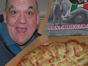 Hal poses with the Hal Anderson & Joe Aiello Pizza from Santa Lucia.