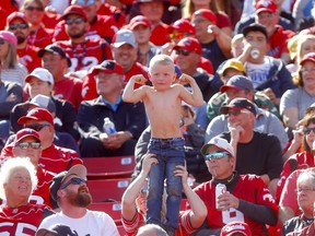 A young Calgary Stampeders fan flexes   as the Stamps beat the Edmonton Eskimos in the Labour Day classic at McMahon stadium in Calgary on Monday, September 2, 2019. Darren Makowichuk/Postmedia