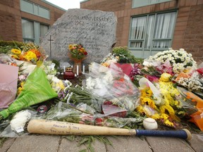 A memorial for members of the Traynor family killed in a murder-suicide Friday morning in their Parklane Ave. home. The messages were scrawled outside Monsignor Paul Dwyer Catholic high school in Oshawa on Monday September 7, 2020.