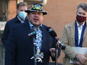 Jerry Daniels (left), Grand Chief of the Southern Chiefs Organization, speaks with Manitoba Liberal leader Dougald Lamont looking ton during a press conference on Adele Avenue in Winnipeg on Wed., Sept. 16, 2020. Kevin King/Winnipeg Sun/Postmedia Network