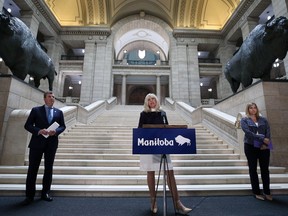 Cathy Cox (centre), Minister Responsible for the Status of Women, is joined by MLA Reg Helwer (left) and civil service commissioner Charlene Paquin at the Manitoba Legislative Building in Winnipeg as she speaks to harassment and sexual harassment in the government workplaces on Thurs., Sept. 24, 2020. Kevin King/Winnipeg Sun/Postmedia Network