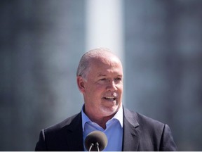 B.C. Premier John Horgan speaks during a transit funding announcement in Surrey, B.C., on Tuesday September 4, 2018.