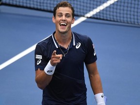 Vasek Pospisil celebrates after his match against Milos Raonic on Day 4 of the 2020 U.S. Open at USTA Billie Jean King National Tennis Center in Flushing Meadows, N.Y., Thursday, Sept. 3, 2020.