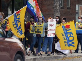 Members of the United Food and Commercial Workers Local 832 picket in front of Stella's on Sherbrook Street in Winnipeg on Mon., Sept. 21, 2020.