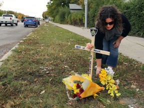 A transit driver died after being hit by a car when he was crossing the street.