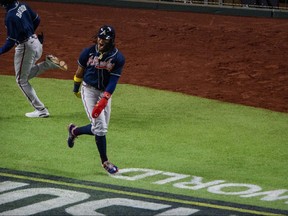 Atlanta Braves centre fielder Ronald Acuna Jr. celebrates after scoring during the ninth inning against the Los Angeles Dodgers during game one of the 2020 NLCS at Globe Life Field in Arlington, Texas, Oct. 12, 2020.