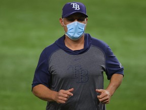 Tampa Bay Rays manager Kevin Cash heads back to the dugout after bringing in Nick Anderson (not pictured) to replace Blake Snell (not pictured) against the Los Angeles Dodgers during Game 6 of the World Series.