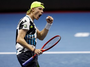 Canada's Denis Shapovalov celebrates after winning his quarter-final match against Switzerland's Stan Wawrinka at the St. Petersburg Open in St. Petersburg, Russia, Oct. 16, 2020.