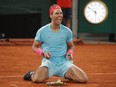 Rafael Nadal celebrates after winning the French Open against Serbia’s Novak Djokovic.