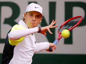 Canada's Denis Shapovalov in action during his second-round French Open match against Spain's Roberto Carballes Baena Thursday, October 1, 2020.