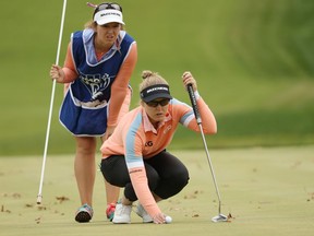Brooke Henderson of Canada lines up a putt on the tenth green during the third round of the 2020 KPMG Women's PGA Championship at Aronimink Golf Club on Oct. 10, 2020 in Newtown Square, Pa.