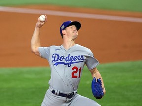 Walker Buehler of the Los Angeles Dodgers pitches against the Tampa Bay Rays during the second inning in Game Three of the 2020 MLB World Series at Globe Life Field on Friday, Oct. 23, 2020 in Arlington, Texas.