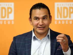 Provincial NDP leader Wab Kinew speaks with media ahead of its alternative throne speech during a press conference in its caucus room at the Manitoba Legislative Building in Winnipeg on Tuesday, Oct. 6, 2020.