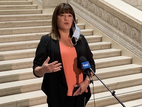 NDP Point Douglas MLA Bernadette Smith speaks with media at the Manitoba Legislature in Winnipeg on Tuesday, over Manitoba’s escalating drug crisis.
