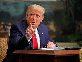 U.S. President Donald Trump participates in a Thanksgiving teleconference with members of the United States Military, at the White House in Washington, D.C., on Nov. 26, 2020.