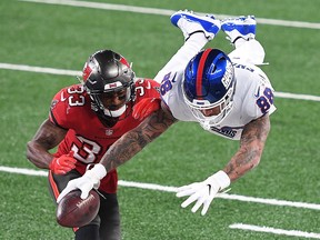 Evan Engram of the New York Giants comes up short as he dives for the end zone against Jordan Whitehead of the Tampa Bay Buccaneers at MetLife Stadium on November 2, 2020 in East Rutherford, New Jersey.