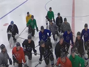 Members of the Winnipeg Blues of the Manitoba Junior Hockey League take part in a practice in Warren, Man., on Monday, Nov. 9, 2020. Booking their practice times under the name, “Laker Academy,” a local hockey academy run by former Western League and University of Manitoba player Larry Woo, the Blues and expansion Winnpeg Freeze took to the ice in the town of Warren, Man., on Monday afternoon.