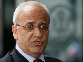 Palestinian negotiator Saeb Erekat speaks to the media after a meeting July 30, 2008 at the U.S. State Department in Washington, D.C.