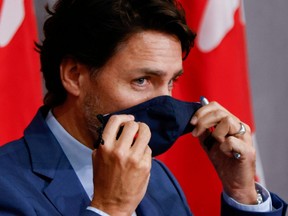 Prime Minister Justin Trudeau prepares to leave a news conference on Parliament Hill in Ottawa, Sept. 25, 2020.