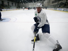 Defenceman Dylan Samberg works on his puck retrieval during Winnipeg Jets development camp at Bell MTS Iceplex on Tuesday, June 25, 2019.