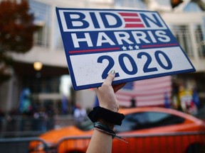 Supporters of President-elect Joe Biden shout across the street towards supporters of U.S. President Donald Trump, the day after a presidential election victory was called for Biden, in Philadelphia, Pennsylvania, U.S. November 8, 2020.