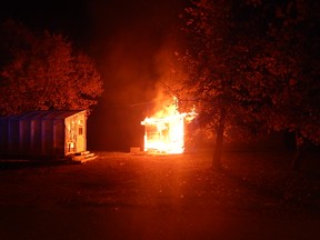 RCMP released a photo on Friday of a house fire that RCMP suspect was arson on Oct. 10 at around midnight in the town of Riding Mountain, about 30 kilometres north of Neepawa.