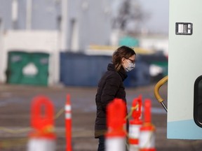 A person walks into a mobile clinic for a COVID-19 test in Winnipeg.