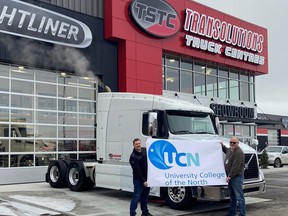 University College of the North Heavy Duty Mechanics Instructor Lyle Skulmoski (left) accepts the donation of donate a 2013 Volvo 630 MR Highway tractor from President and Co-Founder of Transolutions Truck Centre Ken Talbot at the Transolutions Truck Centre in Winnipeg on Friday, Oct. 23.