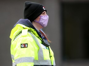 A G4S security member patrols Ellice Avenue in downtown Winnipeg.