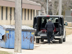 A deceased person is loaded for transport from the St. Norbert Personal Care Home in Winnipeg on Thurs., Nov. 19, 2020. Kevin King/Winnipeg Sun/Postmedia Network