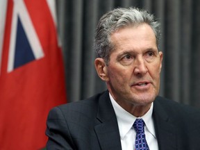 Premier Brian Pallister speaks during a press briefing at the Manitoba Legislative building in Winnipeg on Thursday, Nov. 19, 2020.